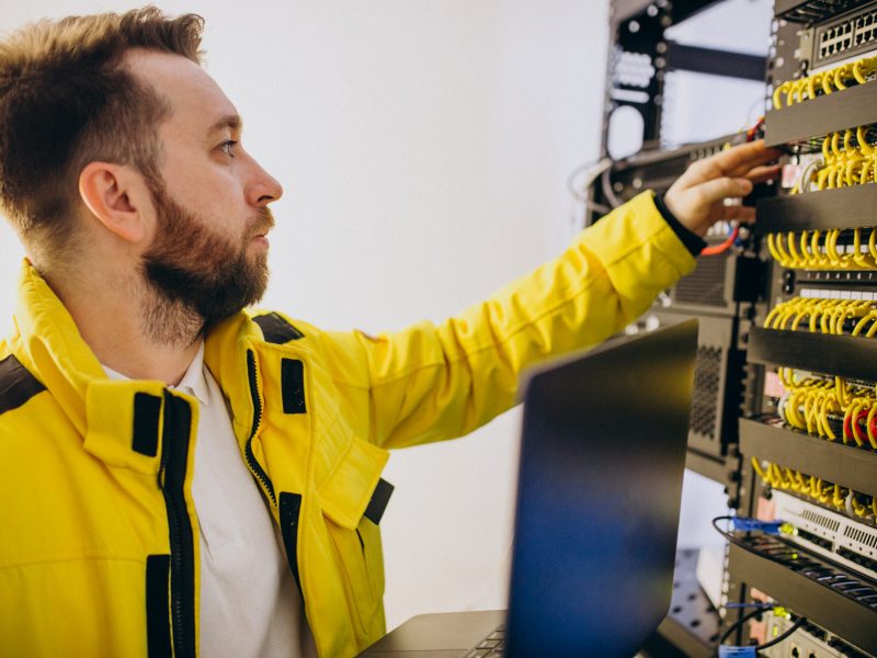 Young man engineer making program analyses